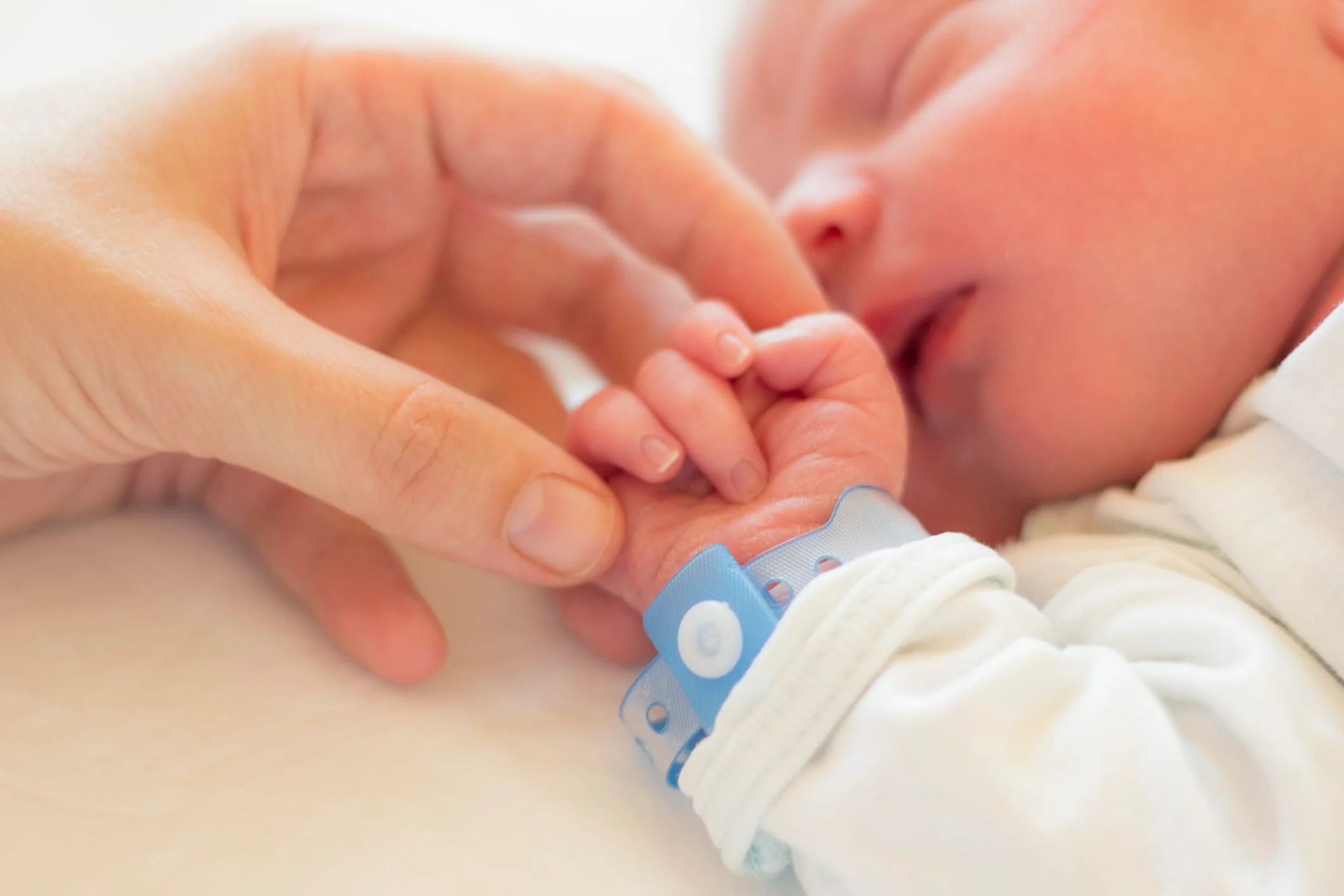 A parent caring for a baby.