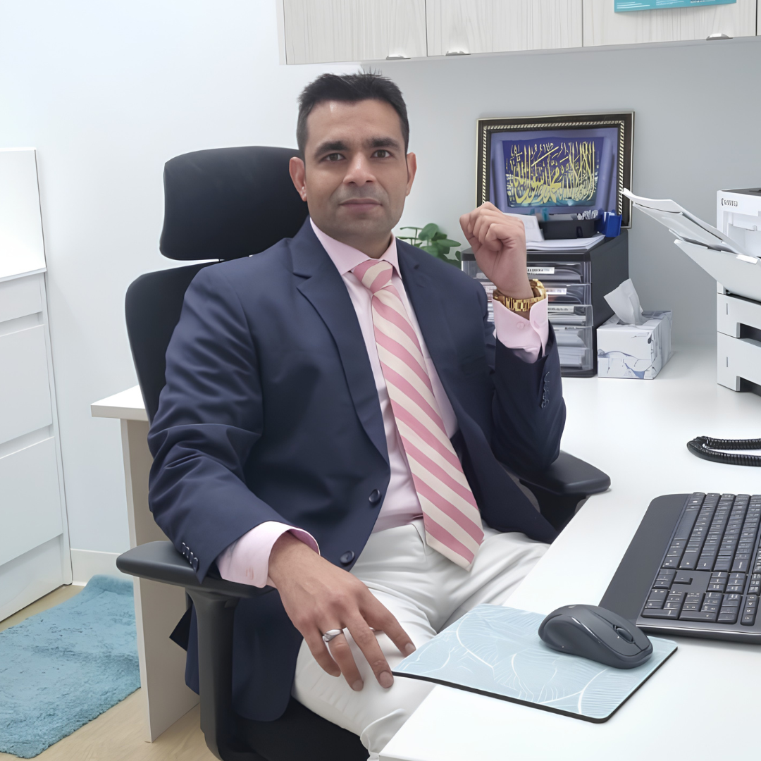 Dr Omair Chaudry in his consulting room.