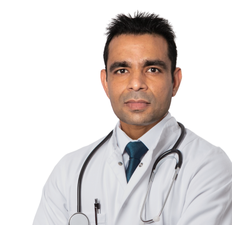 Dr Omair Chaudry in a suit and medical coat.