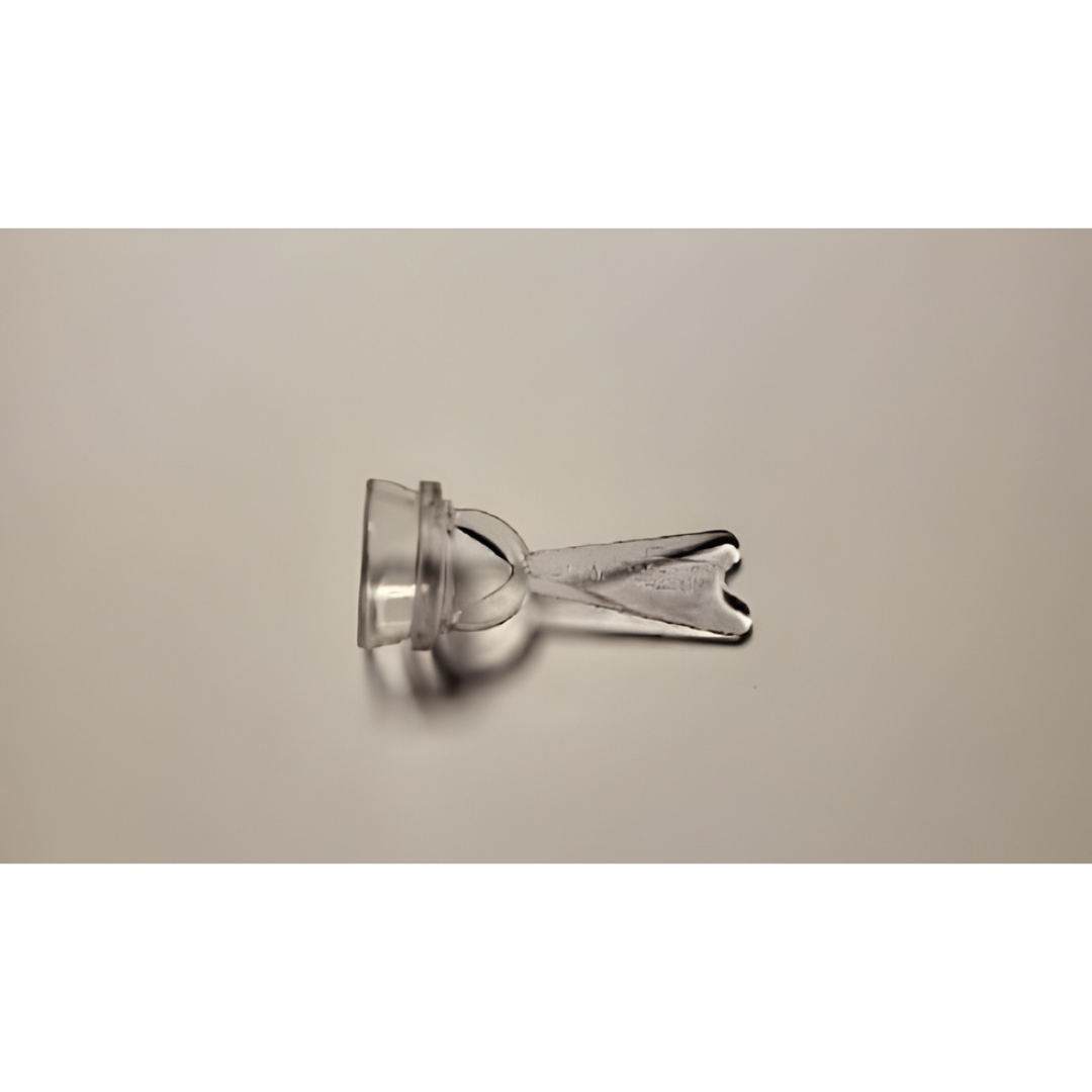 A Plastibell medical device on a neutral background.